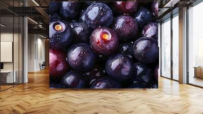 Fresh ripe acai berries with water drops background. Berries backdrop.  Wall mural